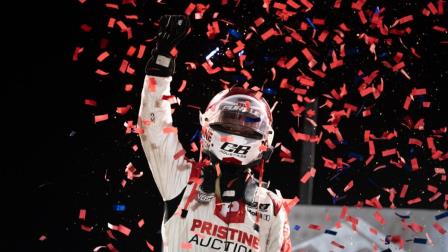 A jubilant Daison Pursley (Locust Grove, Okla.) celebrates his third consecutive USAC NOS Energy Drink Midget National Championship feature victory following Wednesday night's 13th Chad McDaniel Memorial at the Mitchell County Fairgrounds in Beloit, Kansas. (Team Green Productions Photo) (Video Highlights from FloRacing.com)